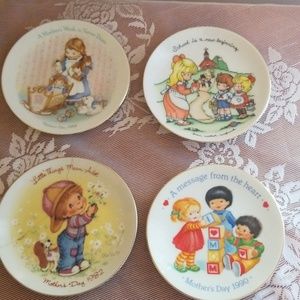 Avon decorative plates set of 4